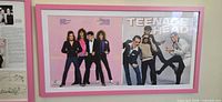 Front view of framed Teenage Head album cover display in pink frame