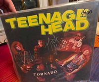Front cover of Teenage Head Tornado LP with visible signatures