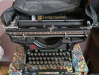 Full view of Underwood typewriter showing keys, carriage and partial dust cover