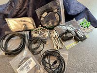 Group shot of all cables, splitters and remote on countertop