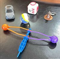 All five items arranged on black surface