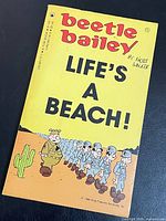 Front cover of Beetle Bailey Life's A Beach! paperback