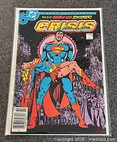 Front cover of bagged comic showing Superman carrying Supergirl