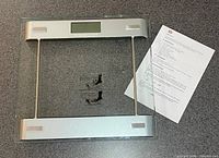 Scale and instruction sheet on countertop