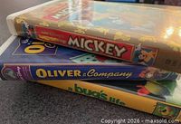 Side view of stacked VHS tapes showing spines