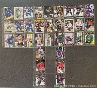 Front view of binder pages showing mix of hockey cards from multiple teams and brands