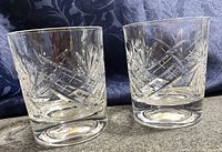 Two cut crystal tumblers front view