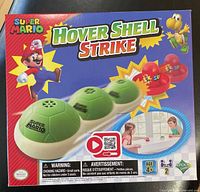 Front of sealed Hover Shell Strike game box with Mario graphic