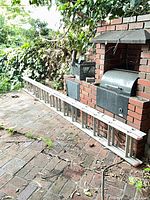 Full view of the 17 ft aluminum ladder on patio