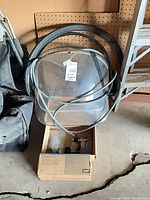 Wheels, fairing, boxed hoist and hardware grouped together