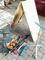 Overall view of board, adjustable bars, foam grips, roller and stand