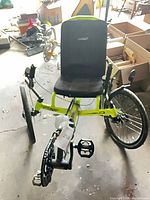 Full view of neon yellow-green Catrike Villager recumbent trike