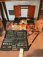 Overview showing Metrinch socket set, Fein case and drill