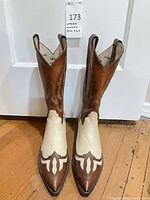 Full frontal view of both boots showing color, style and condition