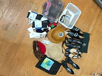 All items laid out: shoes, hats, accessories, socks