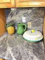 All four pieces grouped on countertop