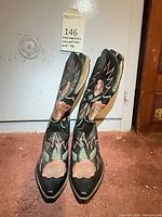 Front view of both boots showing embroidery and pointed toes