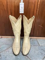 Full front view of both boots showing color, design and wear