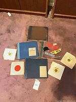 Overview of all binders and 45rpm singles on carpet