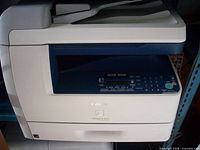 Front view of Canon MF6530 printer showing entire unit