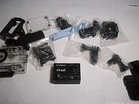 Camera, waterproof housing, mounts, hardware, cloth displayed