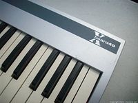 Close-up of right end showing Xboard49 logo and keys