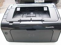 Front and top view showing overall printer and model label