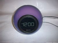 Front view showing LCD display and purple illumination