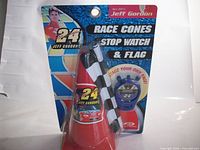 Front view of sealed Jeff Gordon race cones, stopwatch & flag set in original blister pack