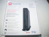 Front of boxed Motorola MG7550 modem-router showing model and features