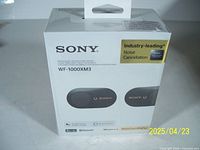 Front of retail box showing model and features