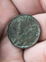 Obverse view of worn 1917 Canadian cent showing King George V portrait