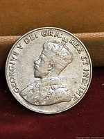 Obverse showing King George V portrait and legend GEORGIVS V DEI GRA REX ET IND IMP