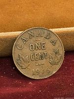 Reverse showing CANADA ONE CENT 1936 with maple leaves