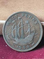Reverse showing Golden Hind ship, HALF PENNY and 1938 legend