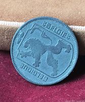 Obverse showing lion and bilingual legend