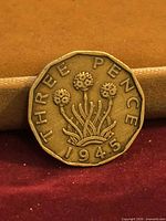 Reverse showing thrift plant and date