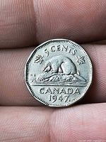 Reverse showing beaver, denomination, date with maple leaf