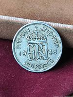 Reverse of 1948 sixpence showing crowned GRI monogram and legends