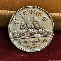 Reverse side showing beaver design and date