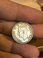 Obverse showing King George VI portrait and legend