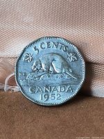 Reverse of 1952 Canadian 5-cent coin showing beaver design and date