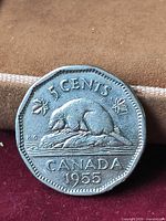 Reverse of 1955 Canadian 5-cent coin showing beaver design and date