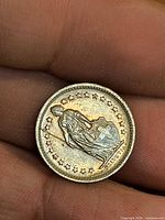 Obverse view of 1963 Swiss 1/2 Franc coin showing Helvetia, stars and rim detail