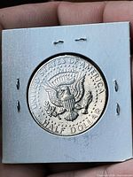 Reverse of 1971 Kennedy Half Dollar in holder