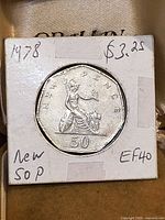 Reverse side showing seated Britannia and denomination