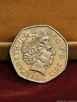 Obverse of 2013 50p coin with Queen Elizabeth II portrait