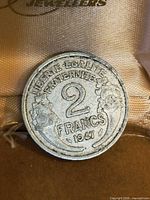 Reverse showing 2 FRANCS 1947 and wreath