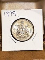 Reverse showing Canadian Coat of Arms and date 1979 in 2x2 holder