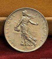 Obverse of 1960 French 1 franc coin showing La Semeuse design and legend